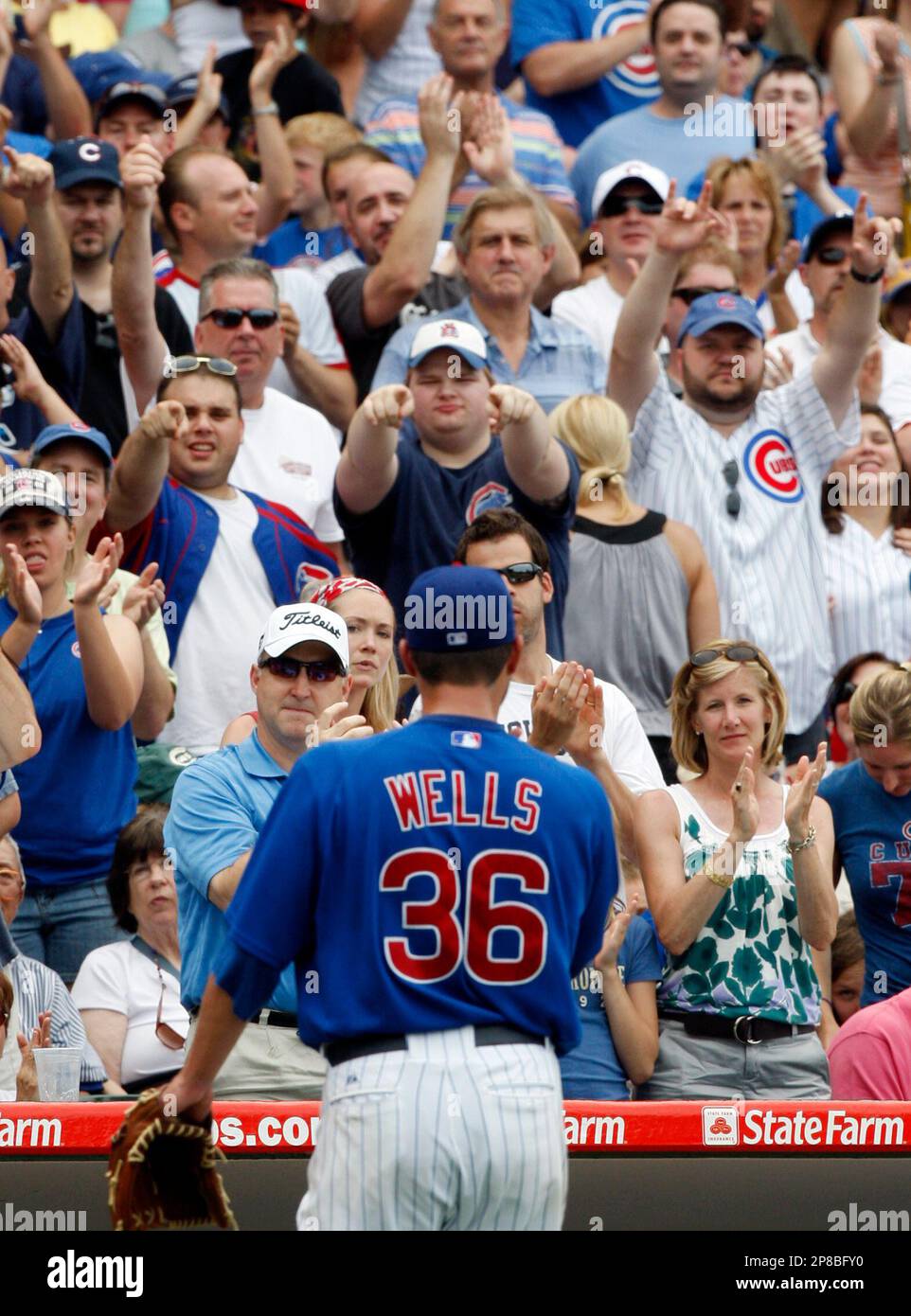 Chicago Cubs starting pitcher JOHN LESTER hands the ball to Cubs Manager JOE  MADDON - Gold Medal Impressions