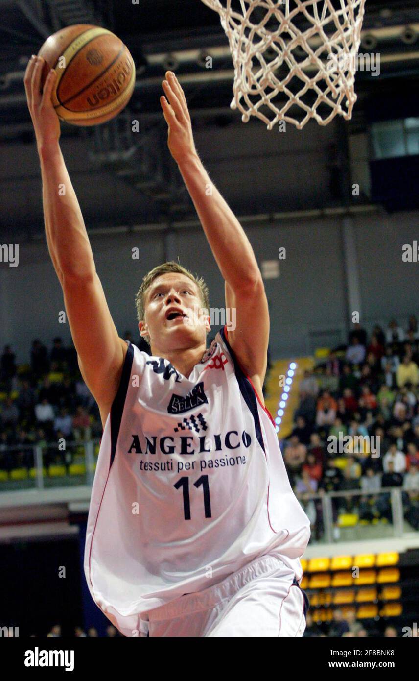 FOR USE AS DESIRED WITH NBA DRAFT STORIES ** FILE - In this photograph  taken on March 15, 2009, Jonas Jerebko of Angelico Biella goes to basket  during a basketball game