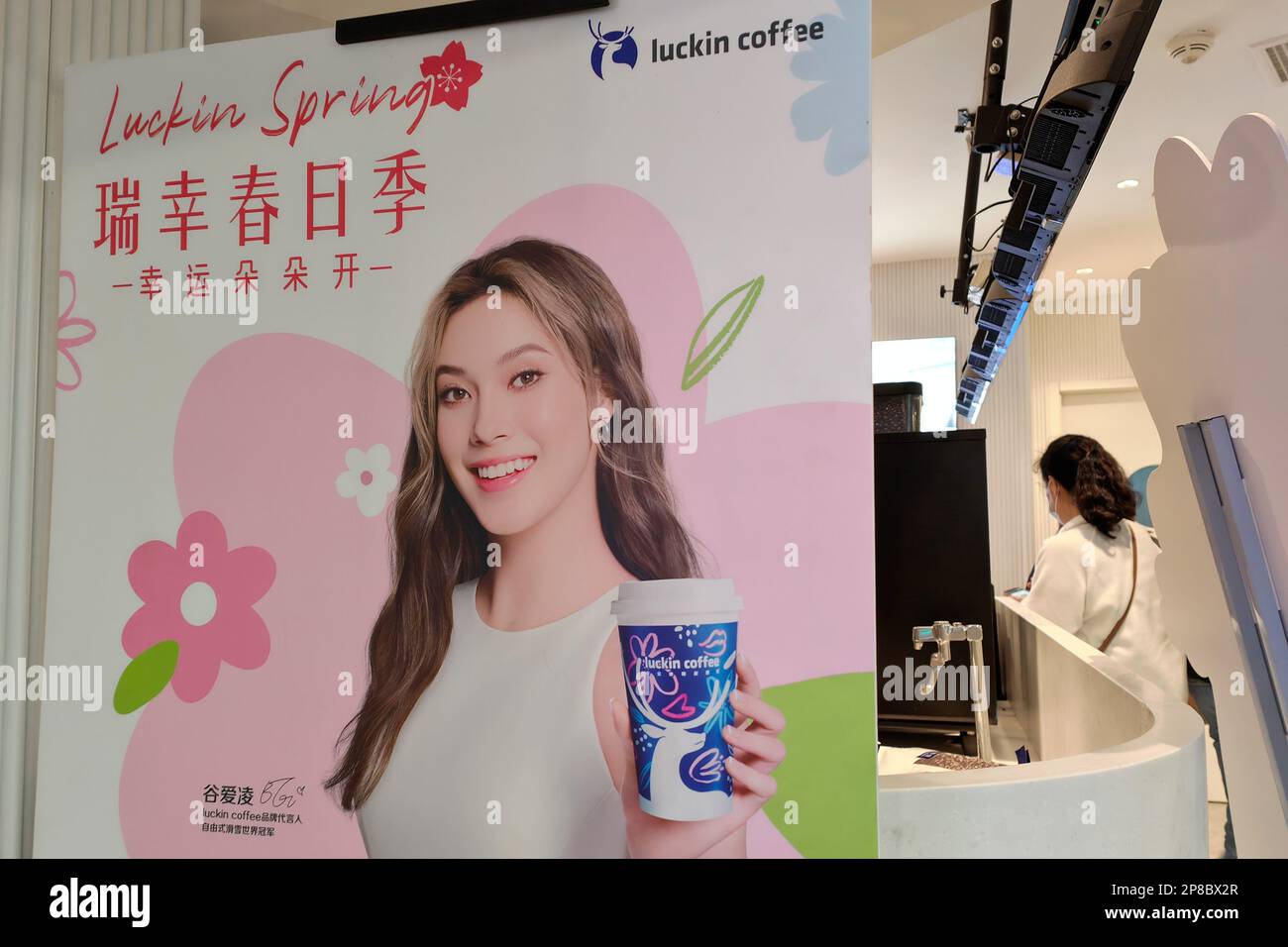 SHANGHAI, CHINA - MARCH 9,2023 - An advertising poster featuring Gu Ailing is displayed at the New World City in Shanghai, China, March 9, 2023. Stock Photo