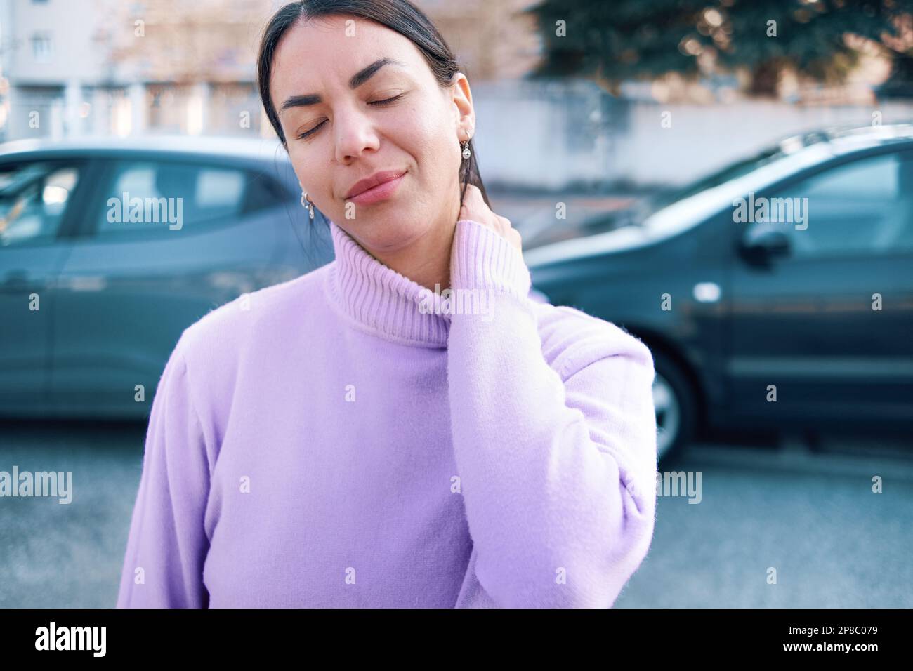 Woman suffering injury after car crash fender bender Stock Photo Alamy