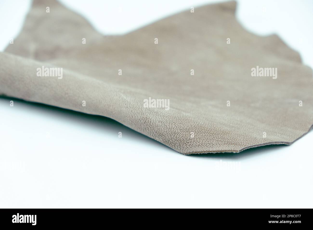 Gray leather is folded on a white background Stock Photo