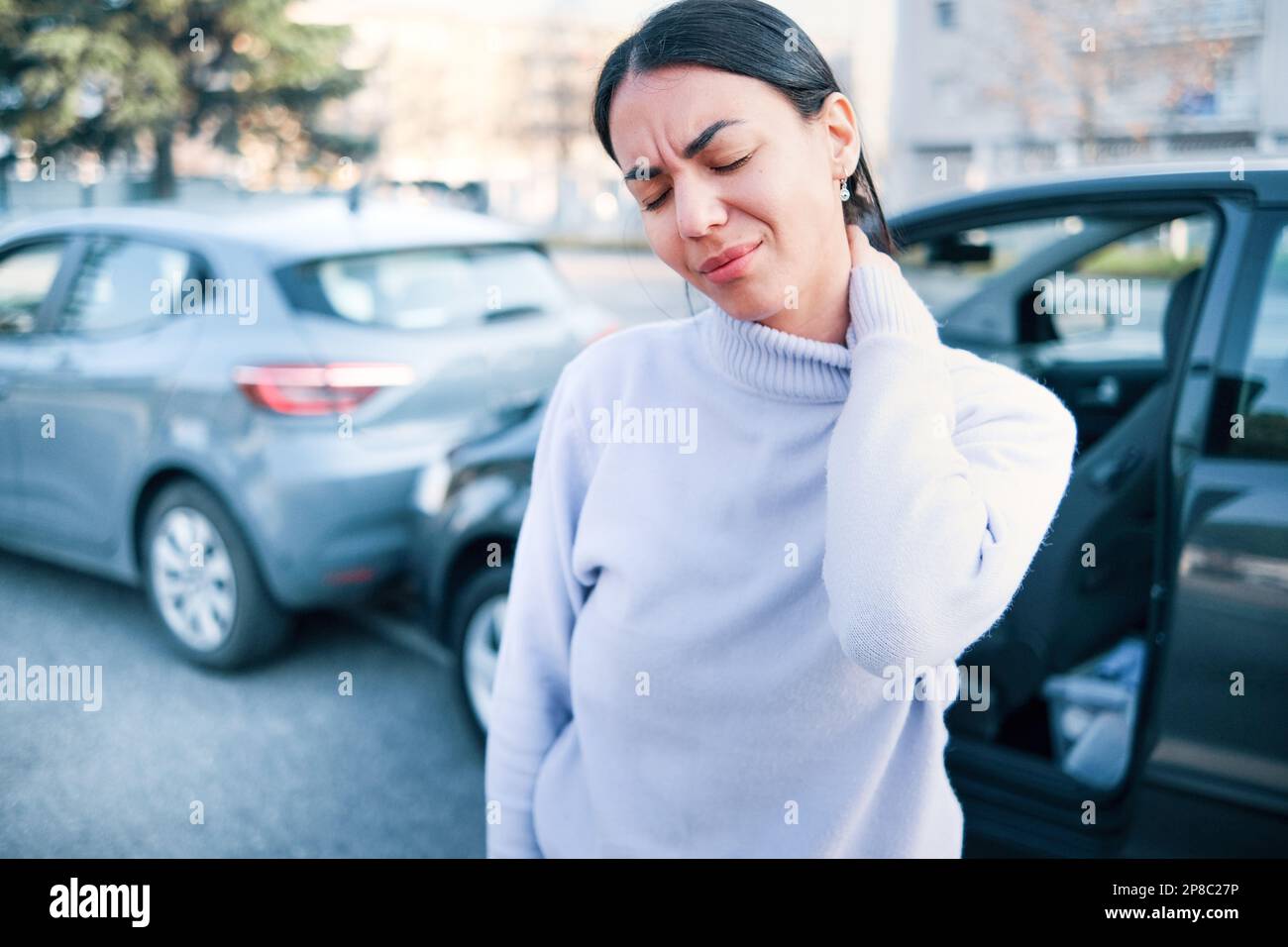 Woman suffering injury after car crash fender bender Stock Photo Alamy