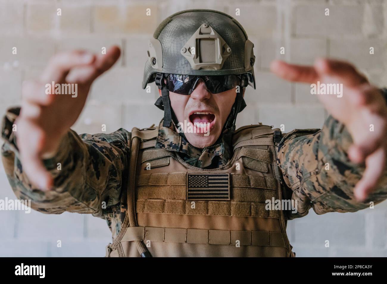 I choose you. A soldier with an outstretched hand towards the camera shows that he chooses you for support and partnership in warfare Stock Photo