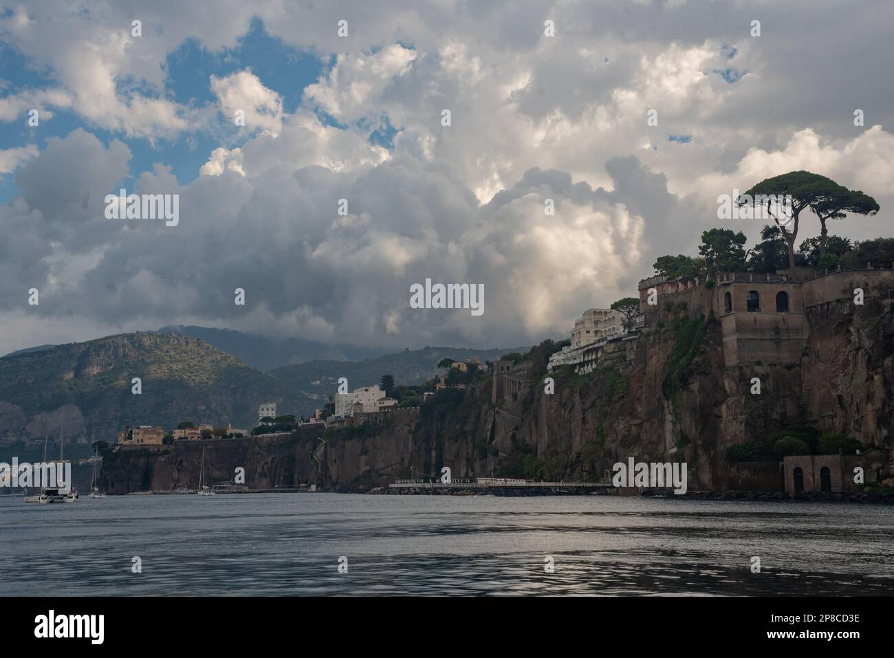 A picturesque view of an island, with its buildings and hills in ...