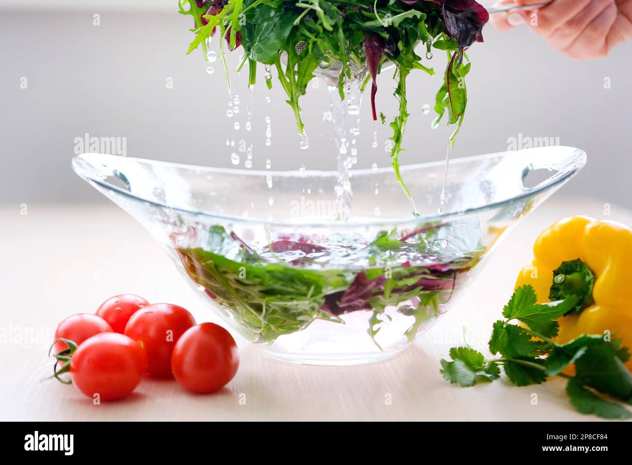 pour water and wash vegetables greens cooking delicious healthy food