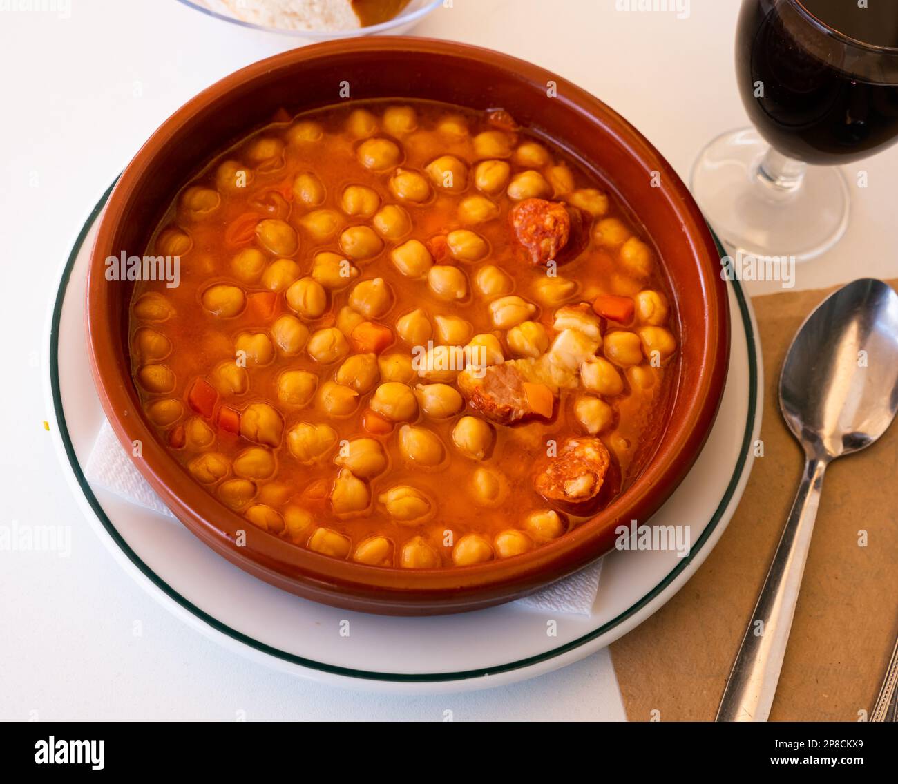 Garbanzos a la riojana, a spanish chickpeas stew with ham Stock Photo