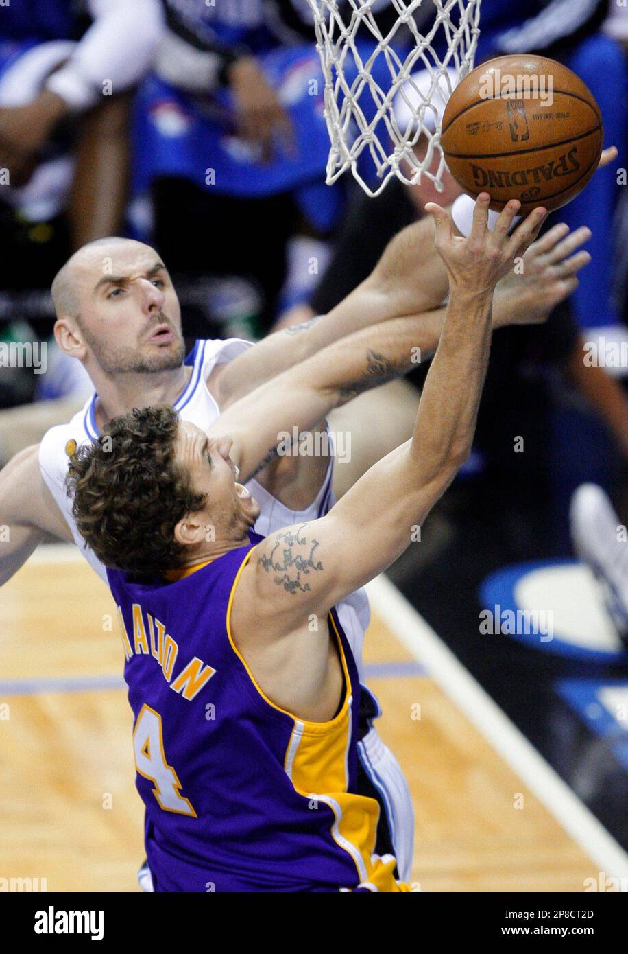 Orlando Magic's Marcin Gortat, from Poland, blocks a shot by Los Angeles  Lakers' Luke Walton (4) in the fourth quarter of Game 3 of the NBA  basketball finals Tuesday, June 9, 2009,
