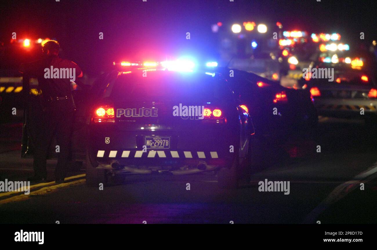 Police investigate the scene of a shooting in Tobyhanna, Pa. on Sunday