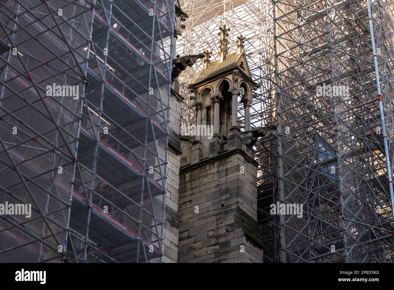 A section of Notre Dame Cathedral surrounded by Scaffolding following the fire in 2019. Stock Photo