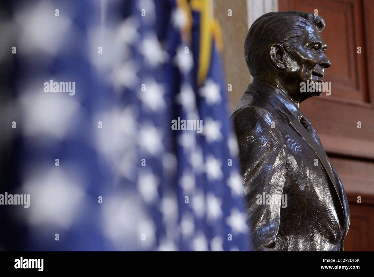 A bronze statue of President Ronald Reagan stands in the Rotunda of the ...