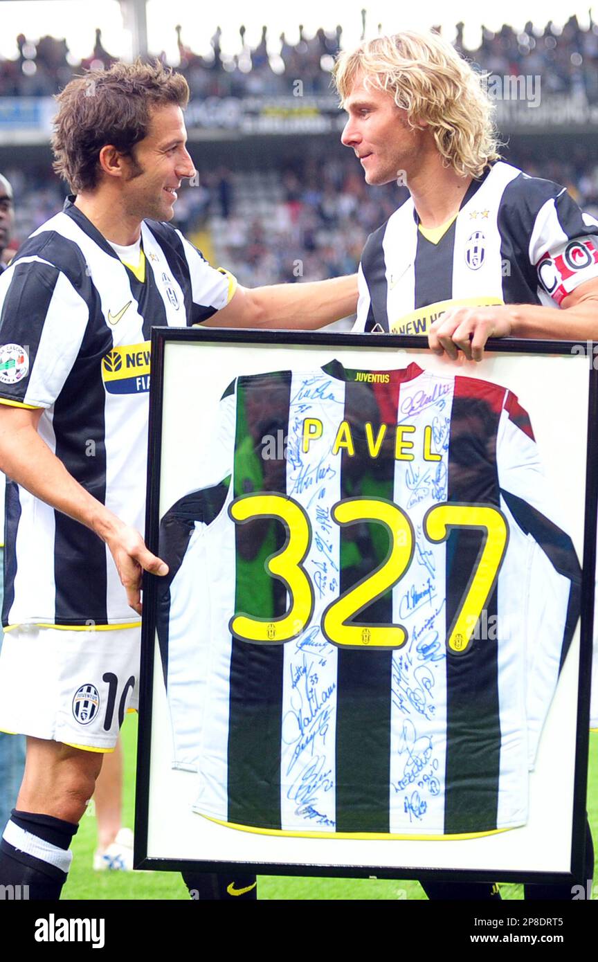Juventus forward Alessandro Del Piero, left, greets Juventus midfielder Pavel  Nedved, of Czech Republic, with a commemorative jersey with the number of  games played with the Turin based team after an Italian