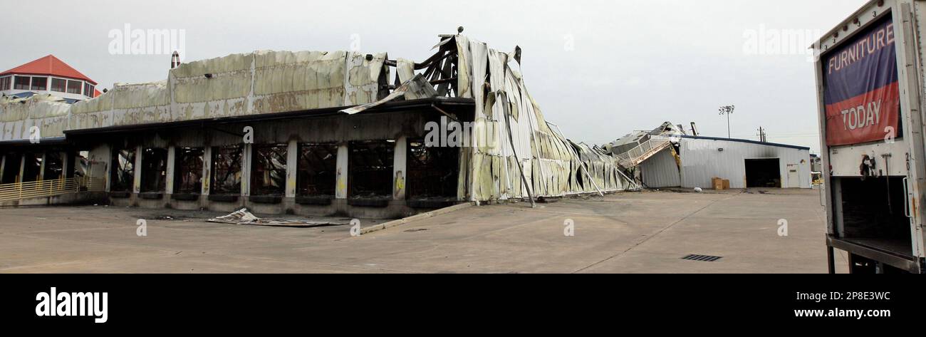 The fire damaged warehouse of Gallery Furniture is shown Thursday