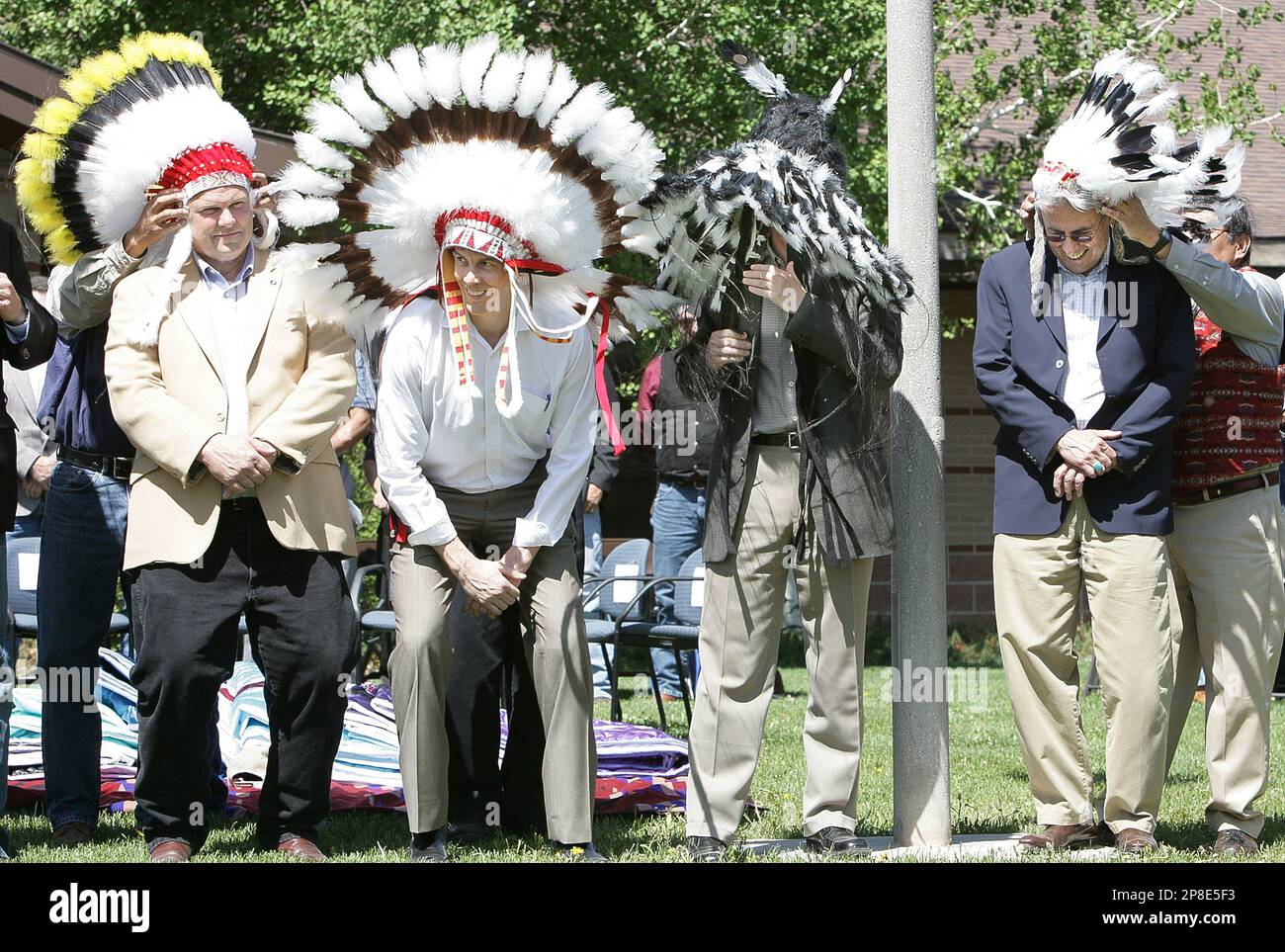 From left to right, Sen. Jon Tester, Education Secretary Arne Duncan