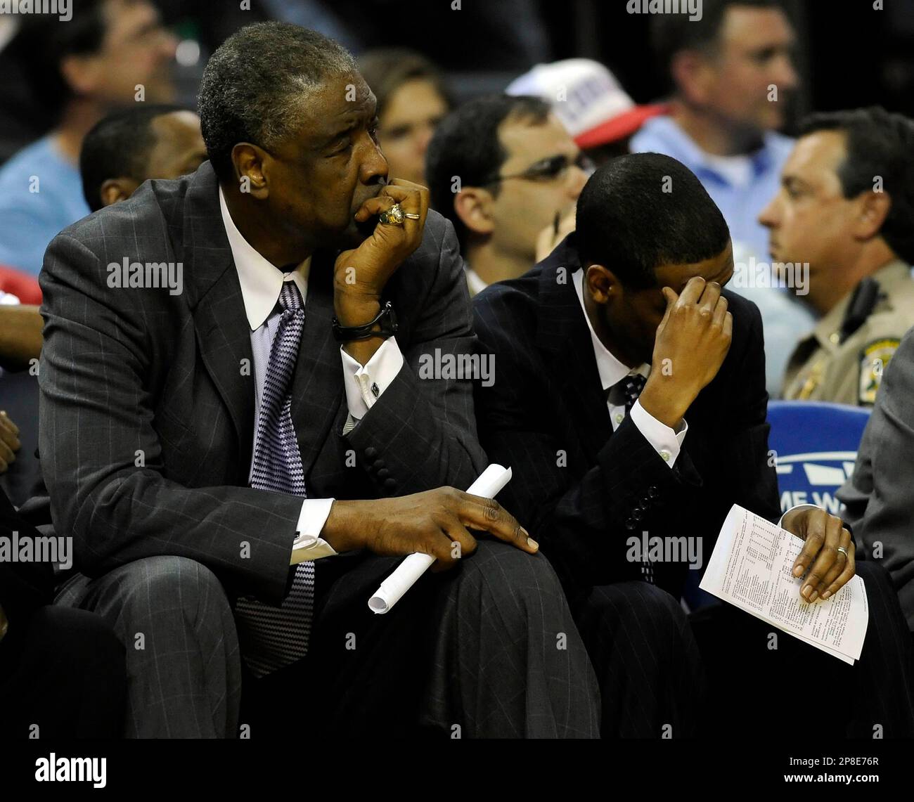 Charlotte, USA. 22nd Apr, 2012. Charlotte Bobcats head coach Paul Silas, left, and assistant coach Stephen Silas watch as their team plays the Sacramento Kings during the second half at Time Warner Cable Arena in Charlotte, North Carolina, on Sunday, April 22, 2012. (Photo by David T. Foster III/Charlotte Observer/TNS/Sipa USA) Credit: Sipa USA/Alamy Live News Stock Photo