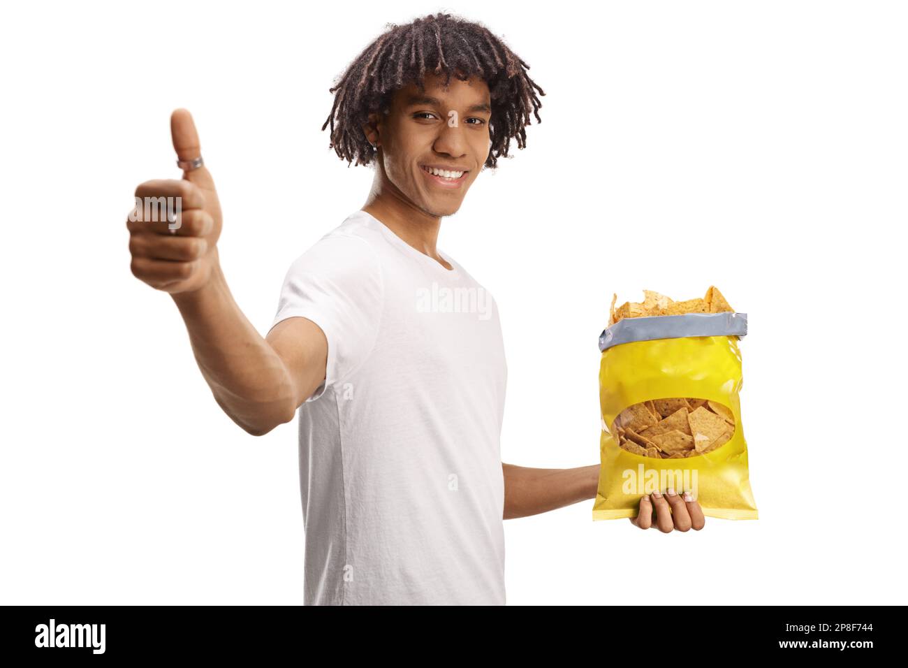 Young african american man with a pack of tortilla crisps gesturing thumbs up isolated on white background Stock Photo