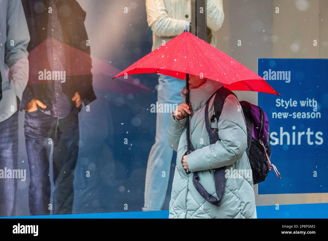 Preston, Lancashire.  UK Weather, 9 Mar 2023.  Shops, shoppers on a winter's day in the city centre. A day of snow and sleet showers in the city centre. The forecast is for cloudy skies and further spells of sleet and snow pushing in from the west, these becoming heavy at times. Credit; MediaWorldImages/AlamyLiveNews Stock Photo