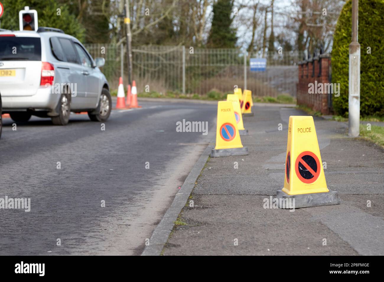 police traffic cones on the pavement to stop people parking when