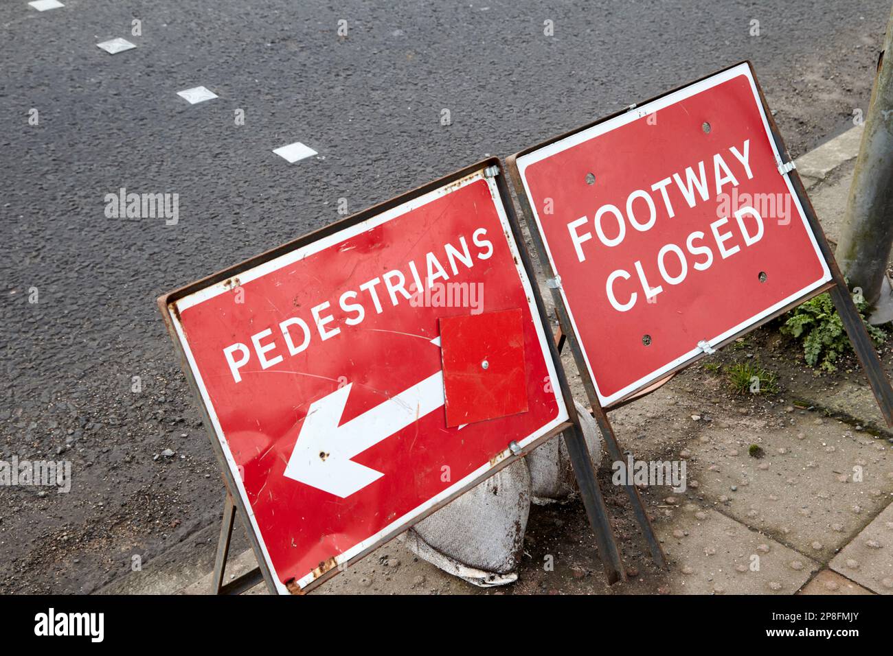 temporary roadway closed pedestrian diversion at crossing Belfast Northern Ireland UK Stock Photo