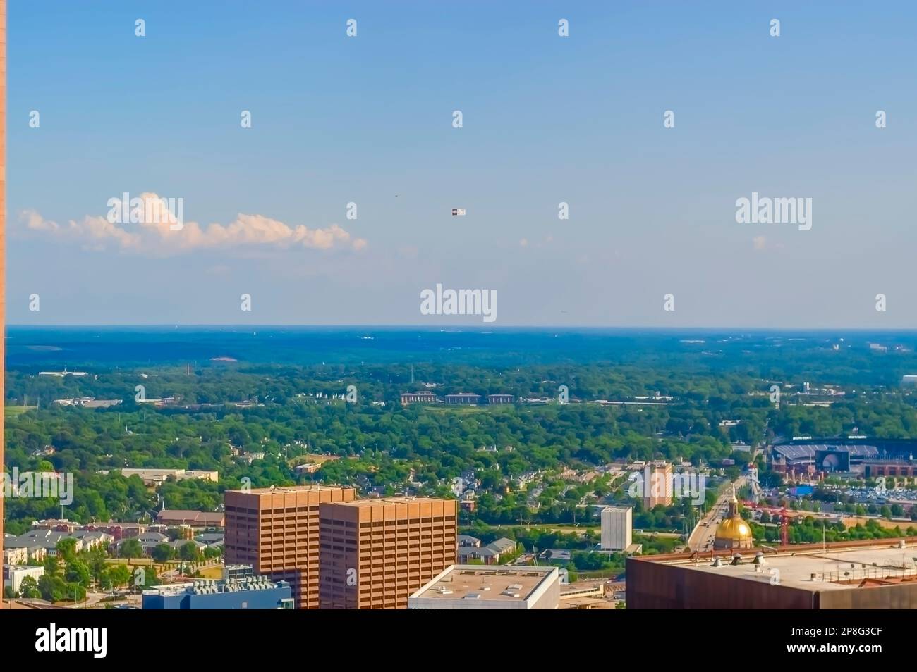 Atlanta landscape and the top sections of Twin Towers State Buildings located in downtown Atlanta, GA, as seen from the Westin Peachtree Plaza Hotel. Stock Photo