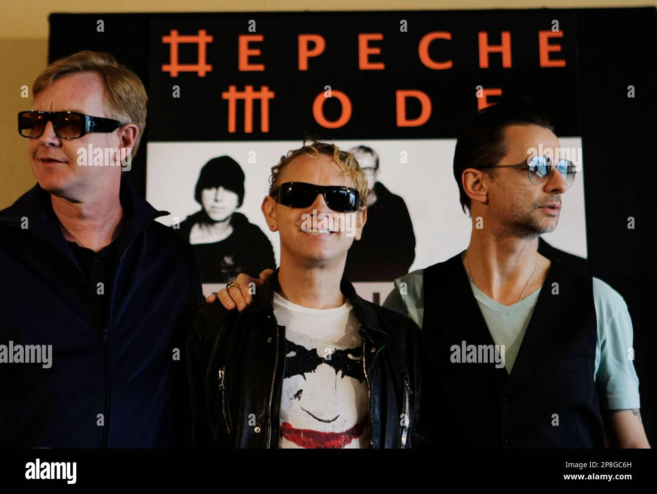 Depeche Mode members Martin Gore,center, Dave Gahan, right, and