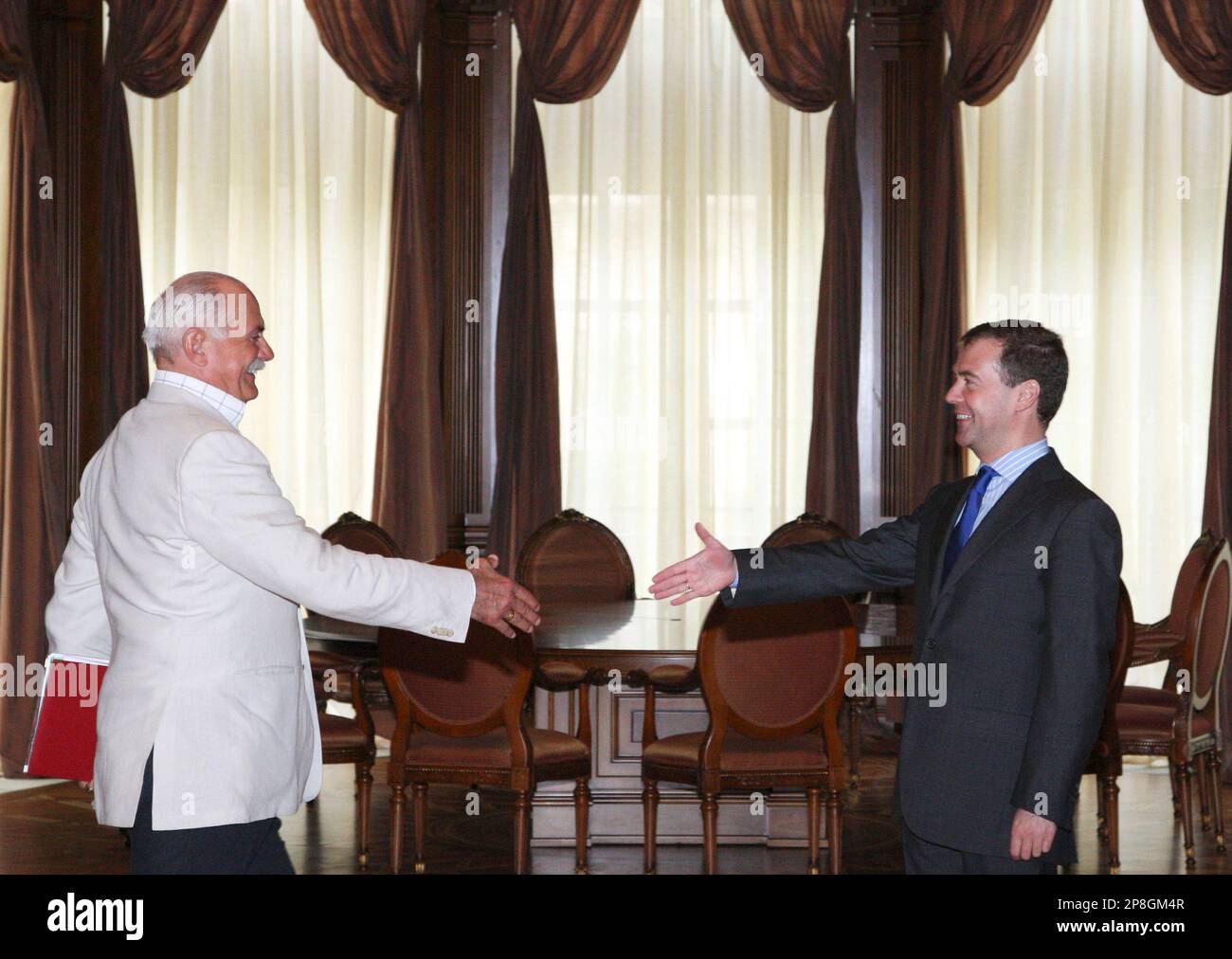 Russian President Dmitry Medvedev, right, greets famous Russian film ...