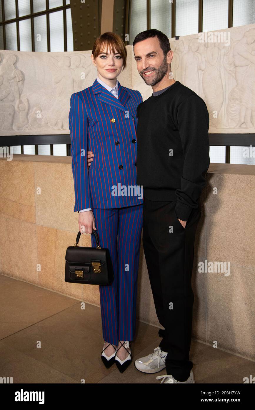 Emma Stone and designer Nicolas Ghesquiere pose for photographers following  the Louis Vuitton Fall/Winter 2023-2024 ready-to-wear collection presented  Monday, March 6, 2023 in Paris. (Vianney Le Caer/Invision/AP Stock Photo -  Alamy