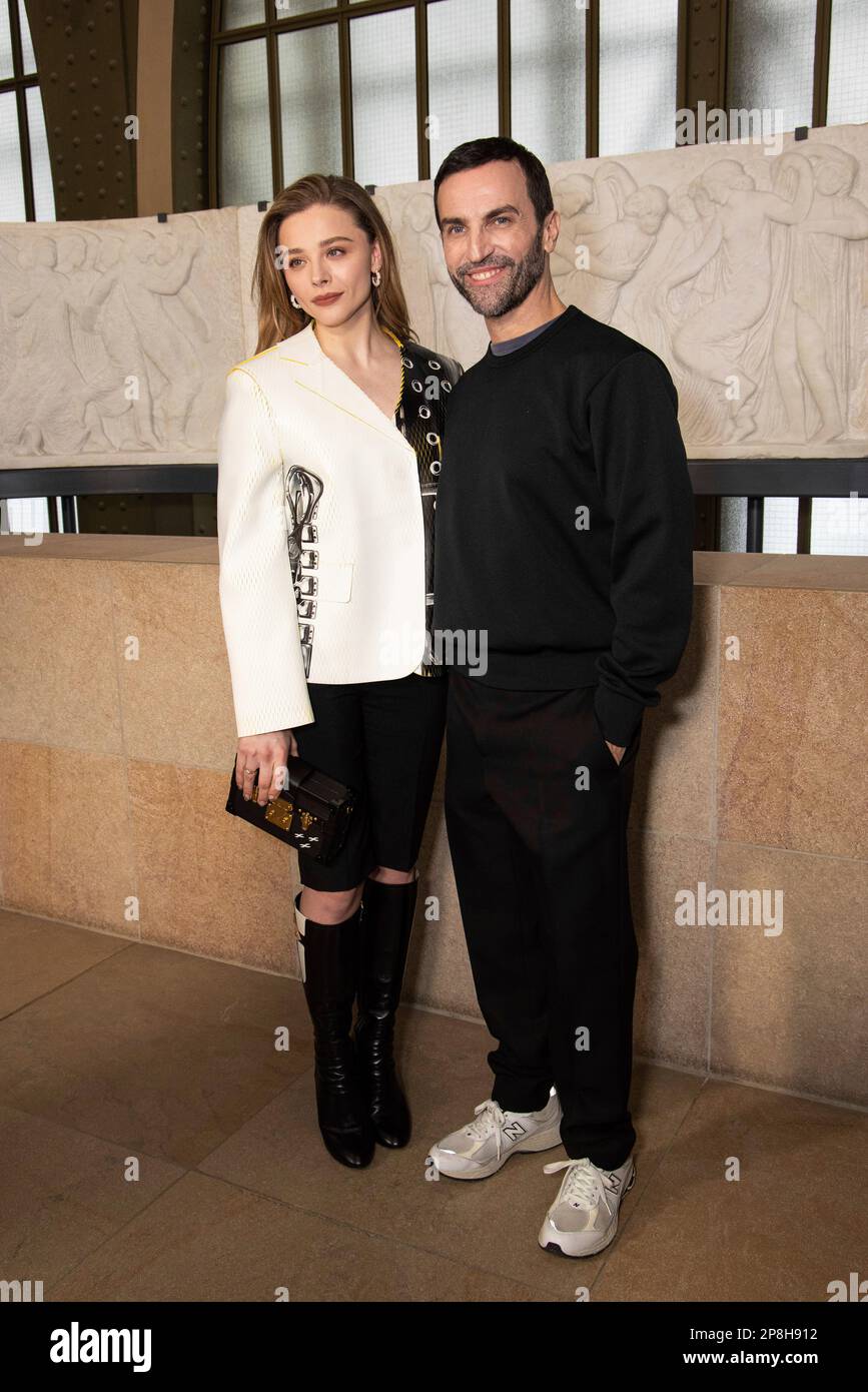Chloe Grace Moretz and designer Nicolas Ghesquiere pose for photographers  following the Louis Vuitton Fall/Winter 2023-2024 ready-to-wear collection  presented Monday, March 6, 2023 in Paris. (Vianney Le Caer/Invision/AP  Stock Photo - Alamy