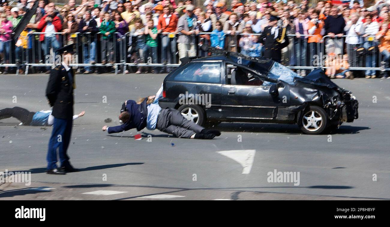 A car ploughs through spectators in Apeldoorn, Netherlands, Thursday