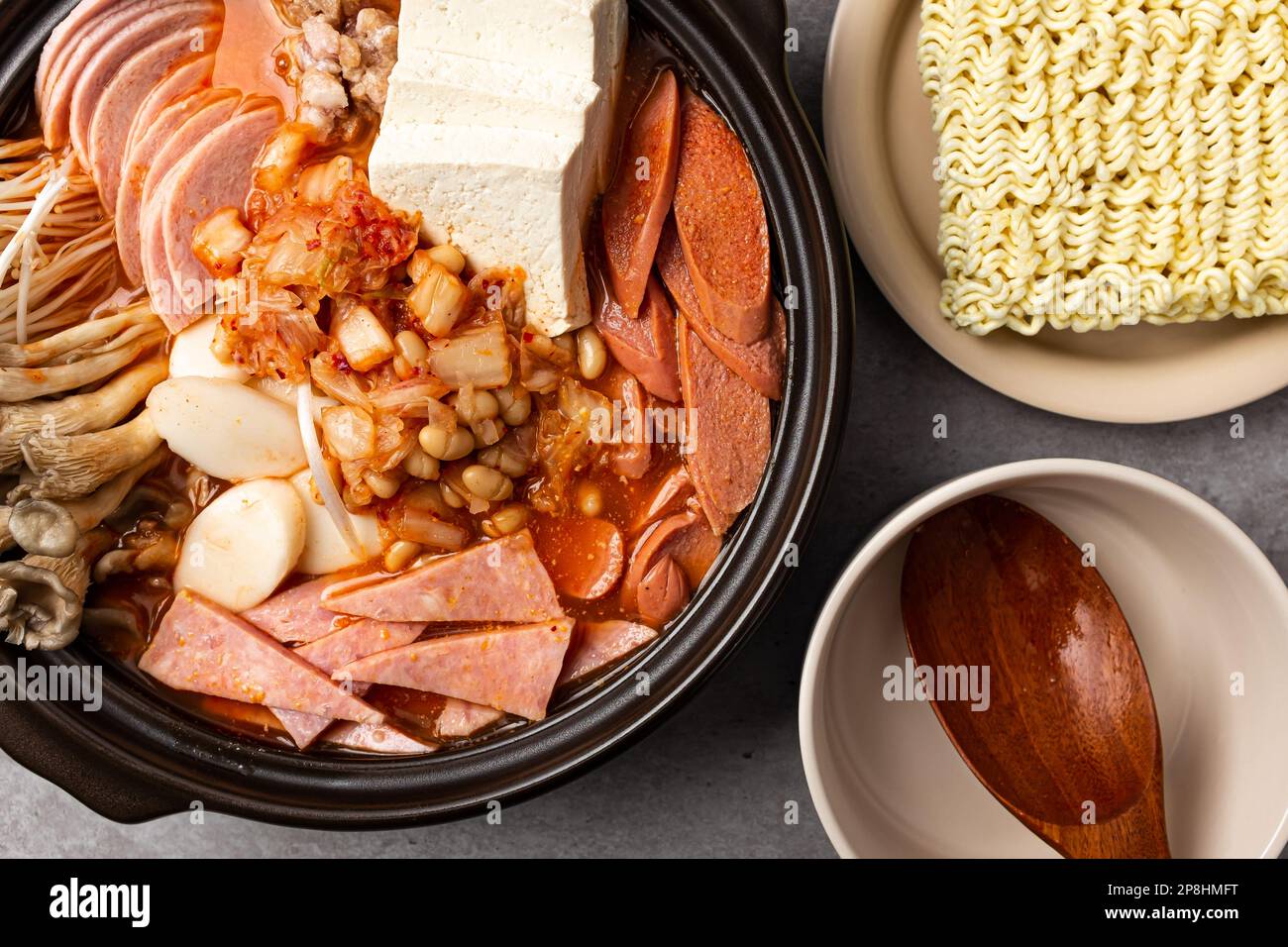 Korean food culture. Soup with ham and sausage. Korean Fusion Cuisine