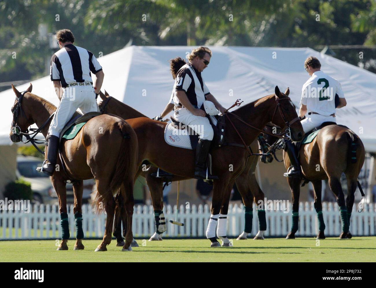 Umpires pause for a moment of silence to remember the horses who died