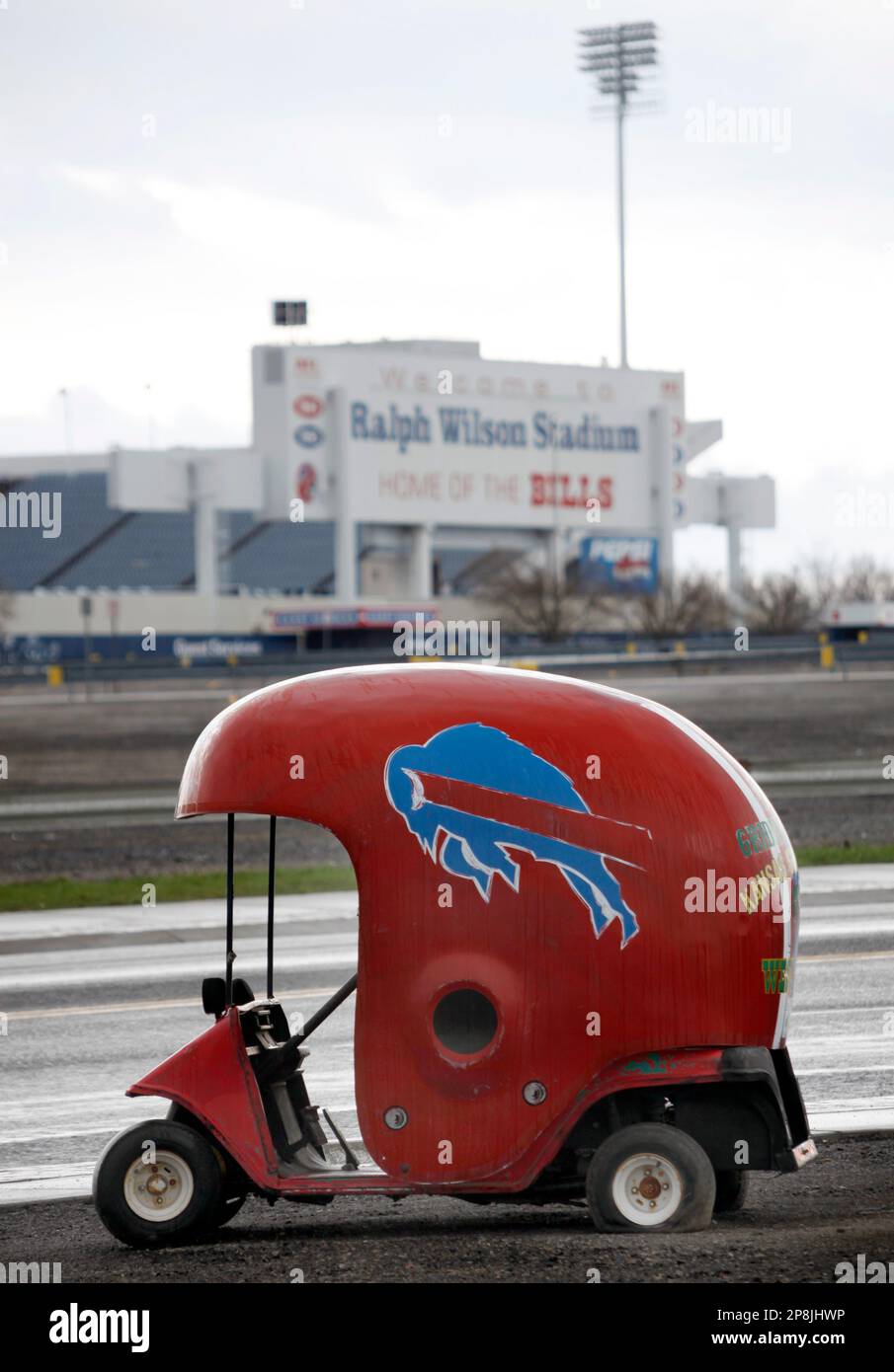 A golf cart in the shape of a Buffalo Bills football helmet is for