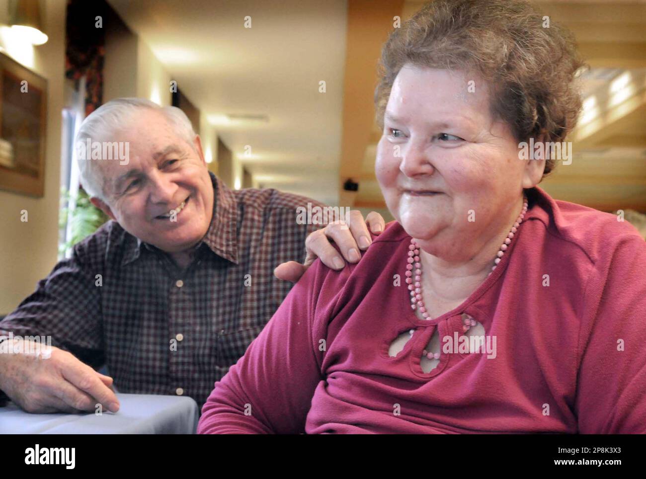 ** ADVANCE FOR SUNDAY, APRIL 19 ** Ray Frey, 73, clasps the shoulder of