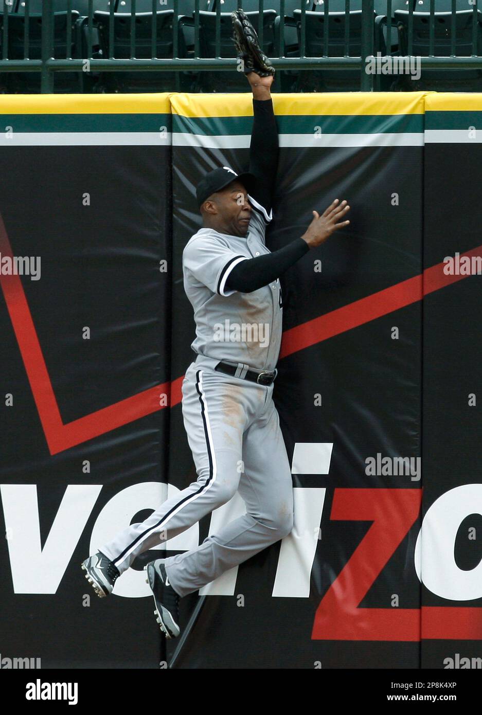 Chicago White Sox right fielder Jermaine Dye hits the outfield