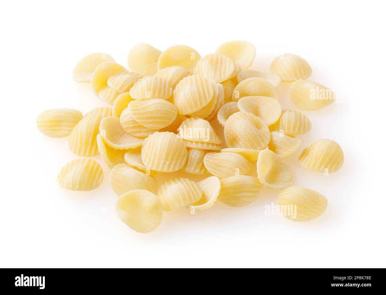 Heap of uncooked orecchiette pasta isolated on white background Stock Photo