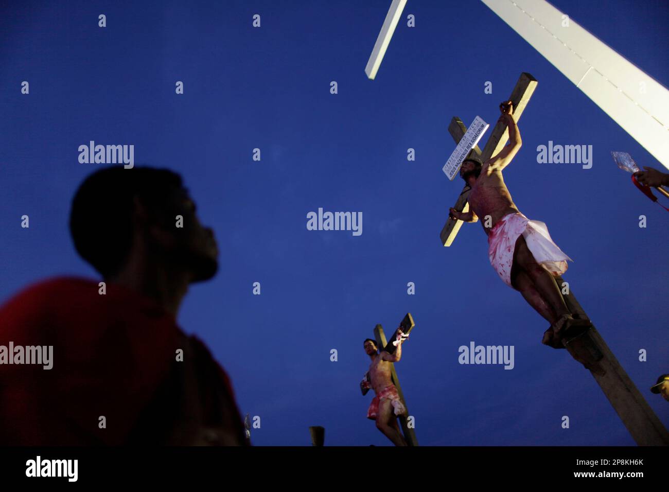 Faithful perform the reenacting of the Jesus Christ's Crucifixion during Holy Week in Caracas