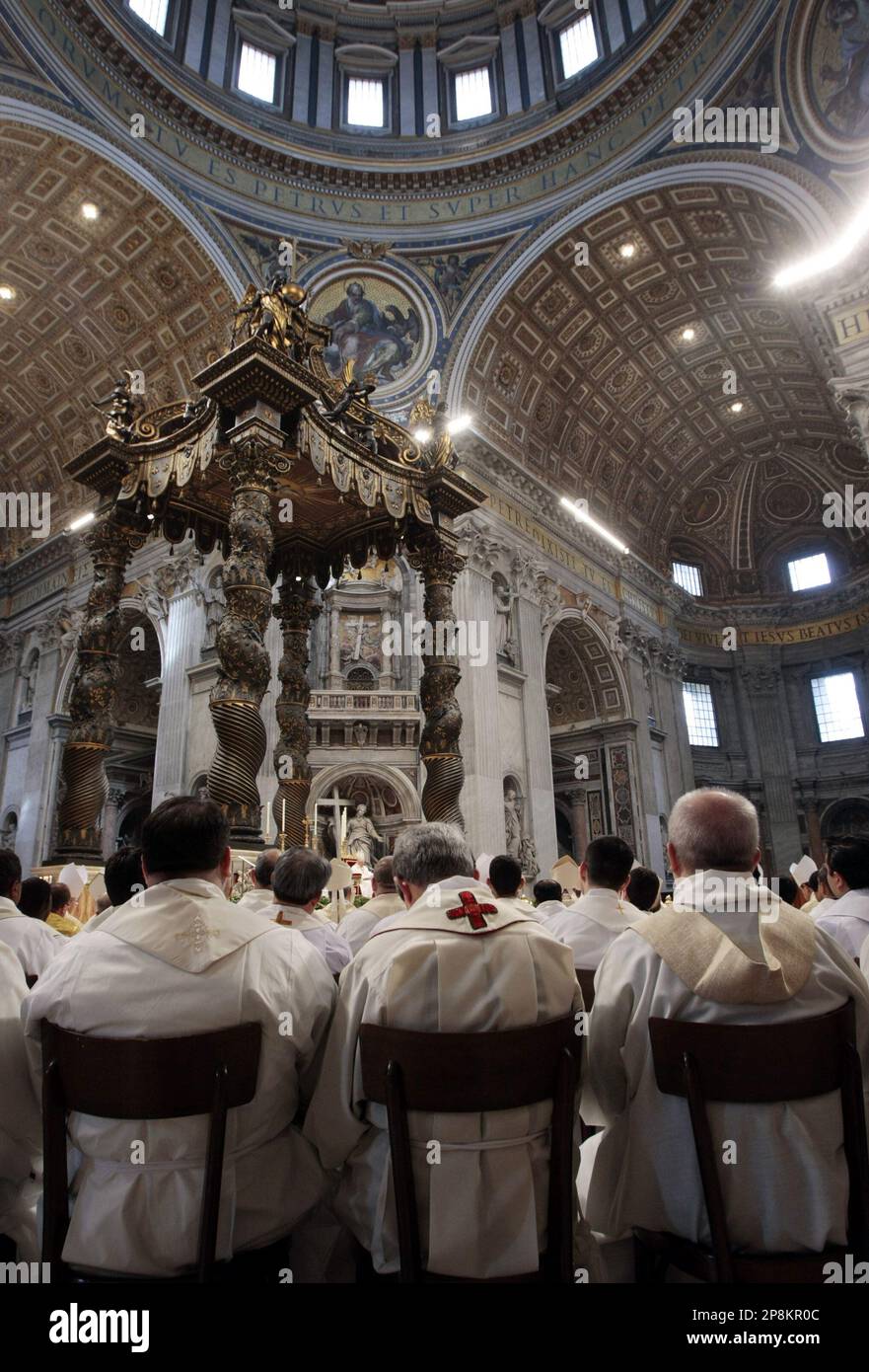 Priests attend as Pope Benedict XVI celebrates a Chrism Mass inside St ...