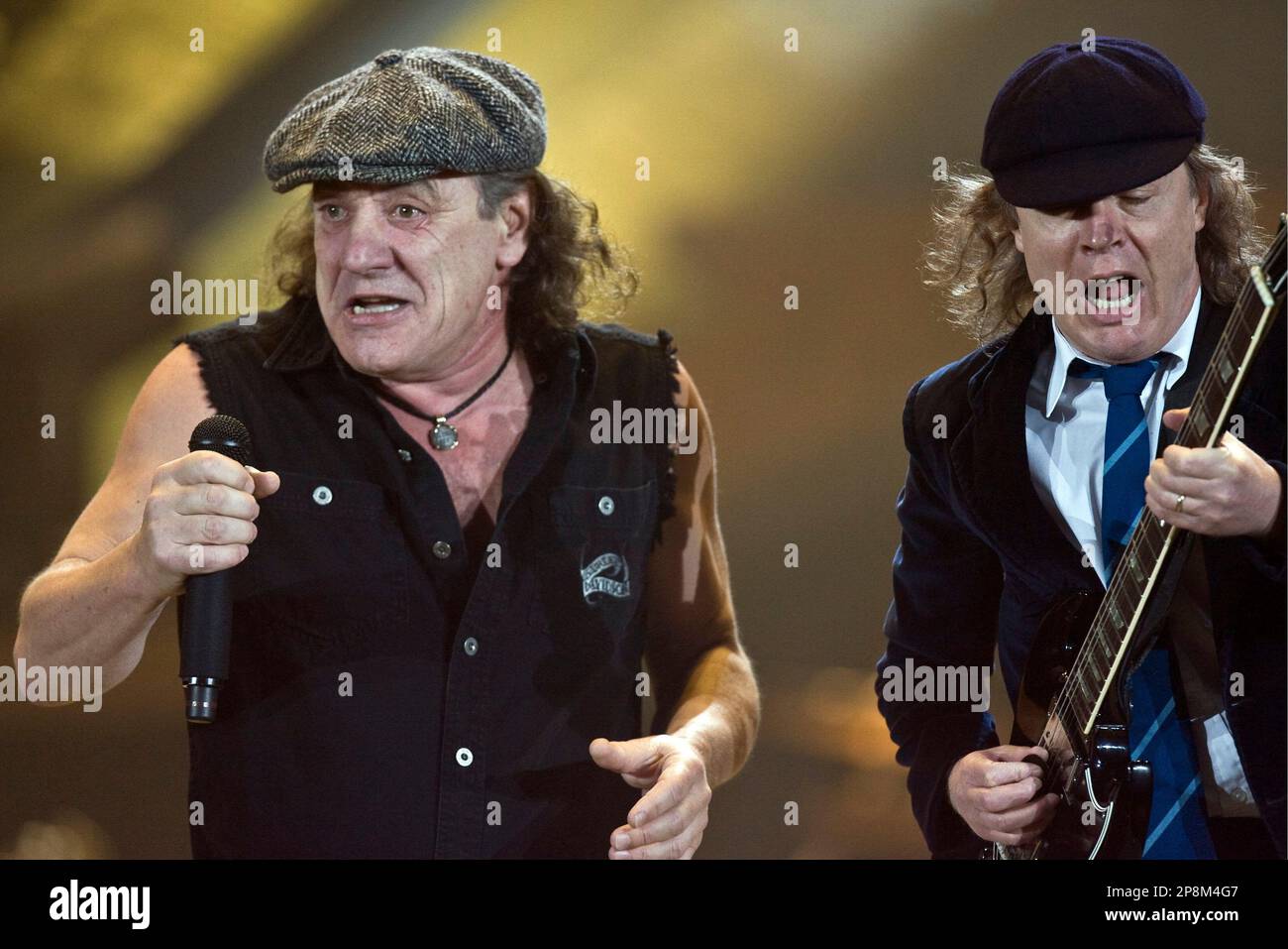 Brian Johnson, left, lead singer of Australian rock band AC/DC and ...
