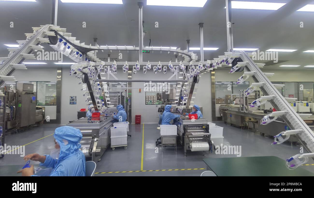Nanchang. 9th Mar, 2023. Workers are busy at the production line of ...