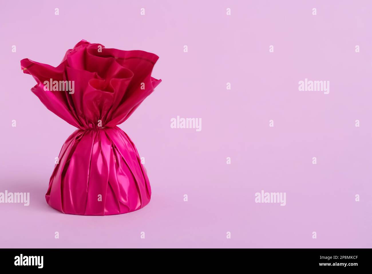 Pink Candy Rapper Candy in bright wrapper on pink background. Space for text Stock Photo ...