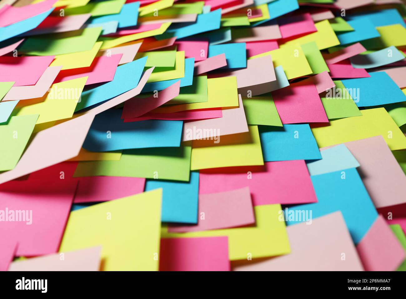 Colorful paper notes as background, closeup view Stock Photo