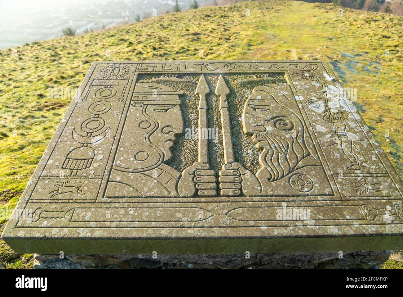 Carvings by the artist Mary Kenny on top of Pirn Hill an Iron Age Hill Fort above Innerleithen, Scotland Stock Photo