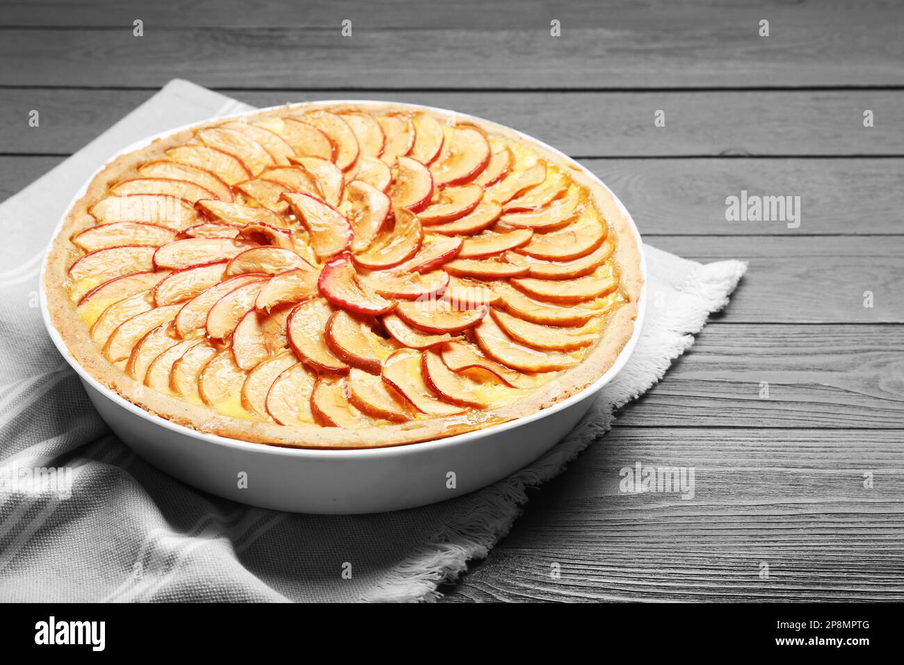 Tasty apple pie on grey wooden table Stock Photo