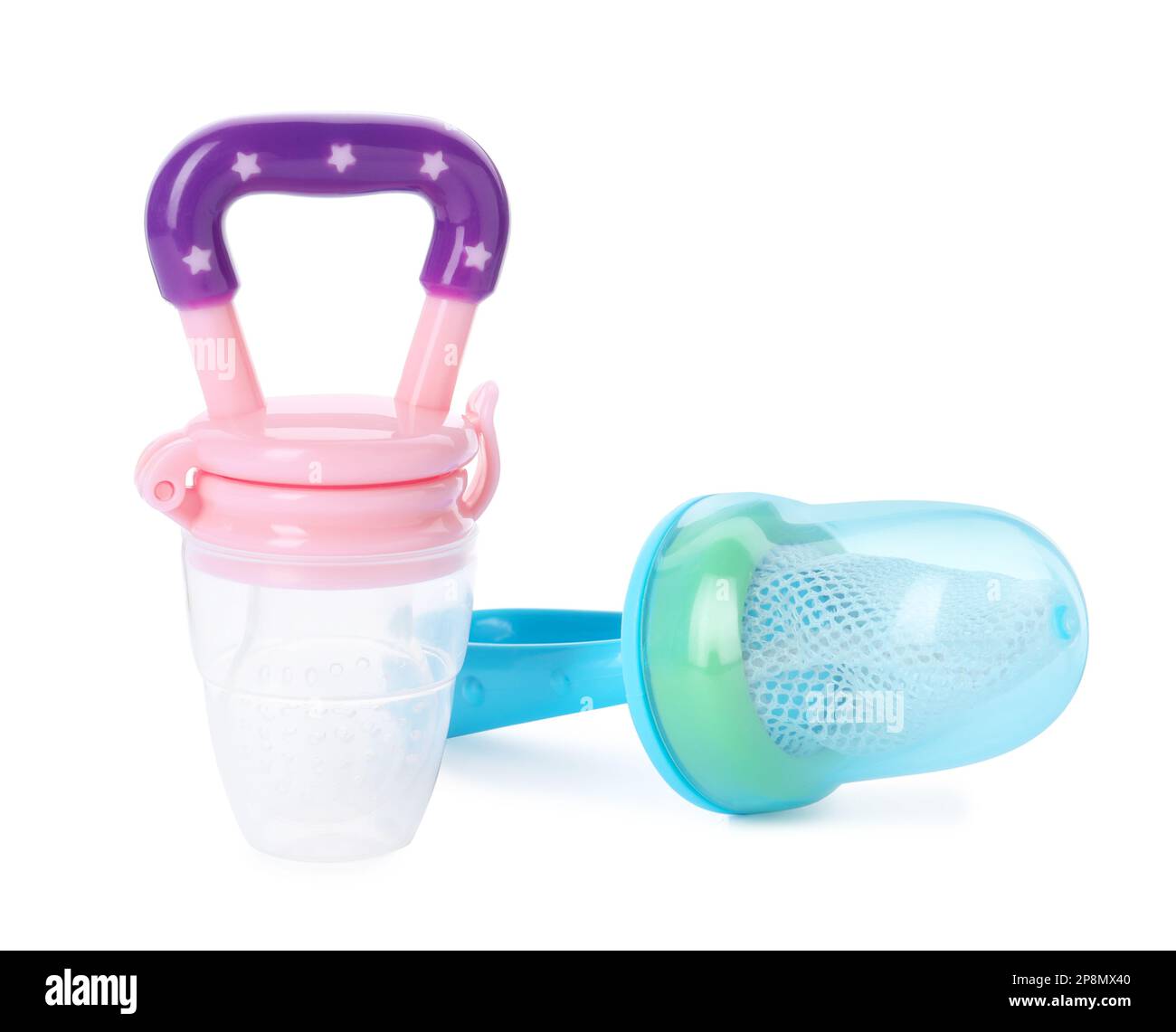 Empty nibblers on white background. Baby feeder Stock Photo Alamy