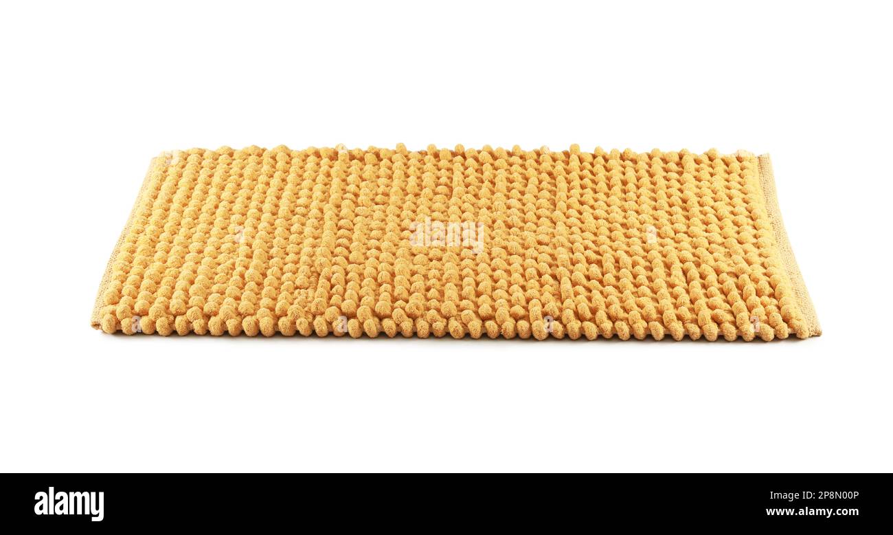 New yellow bath mat isolated on white Stock Photo Alamy