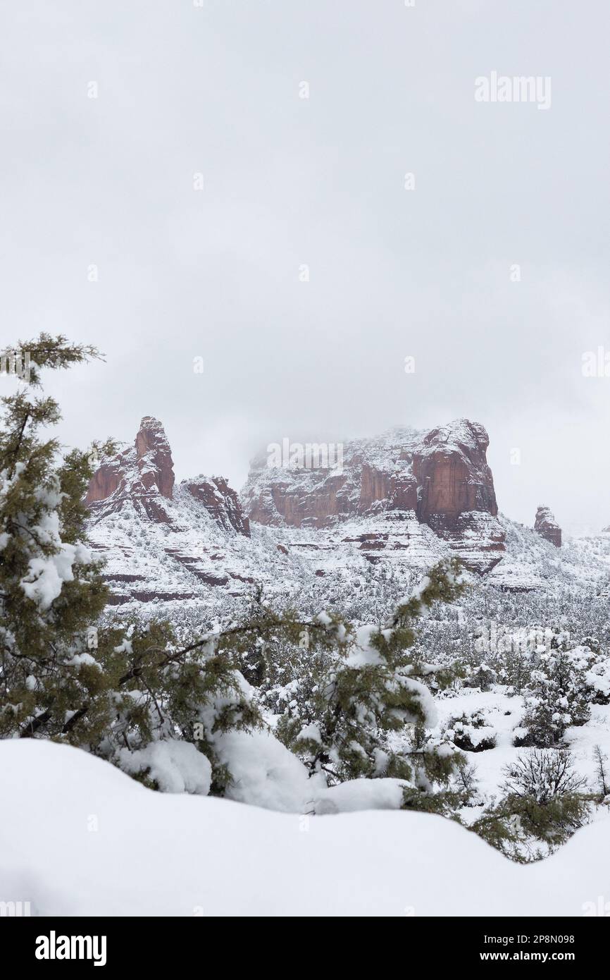 Scenic view of beautiful red rocks covered in snow in Sedona, Arizona ...