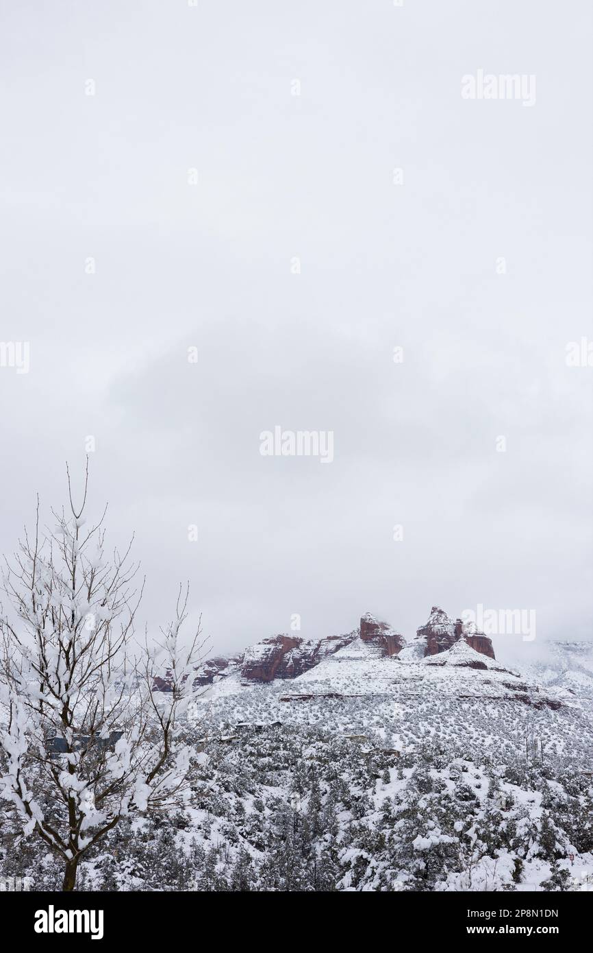 Scenic view of beautiful red rocks covered in snow in Sedona, Arizona ...