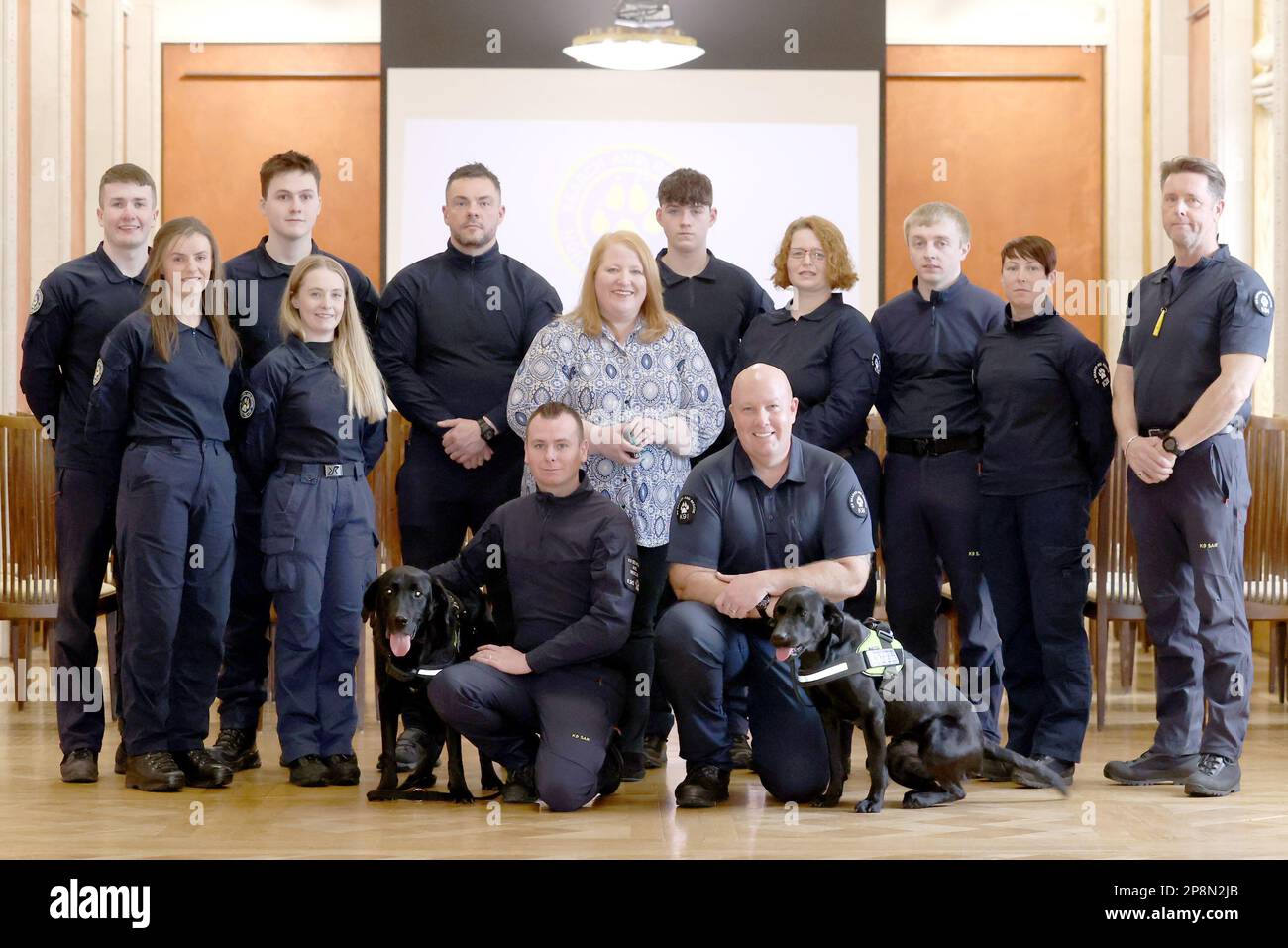 Rescue workers Ryan Gray (left) with his dog Max, and Kyle Murray with