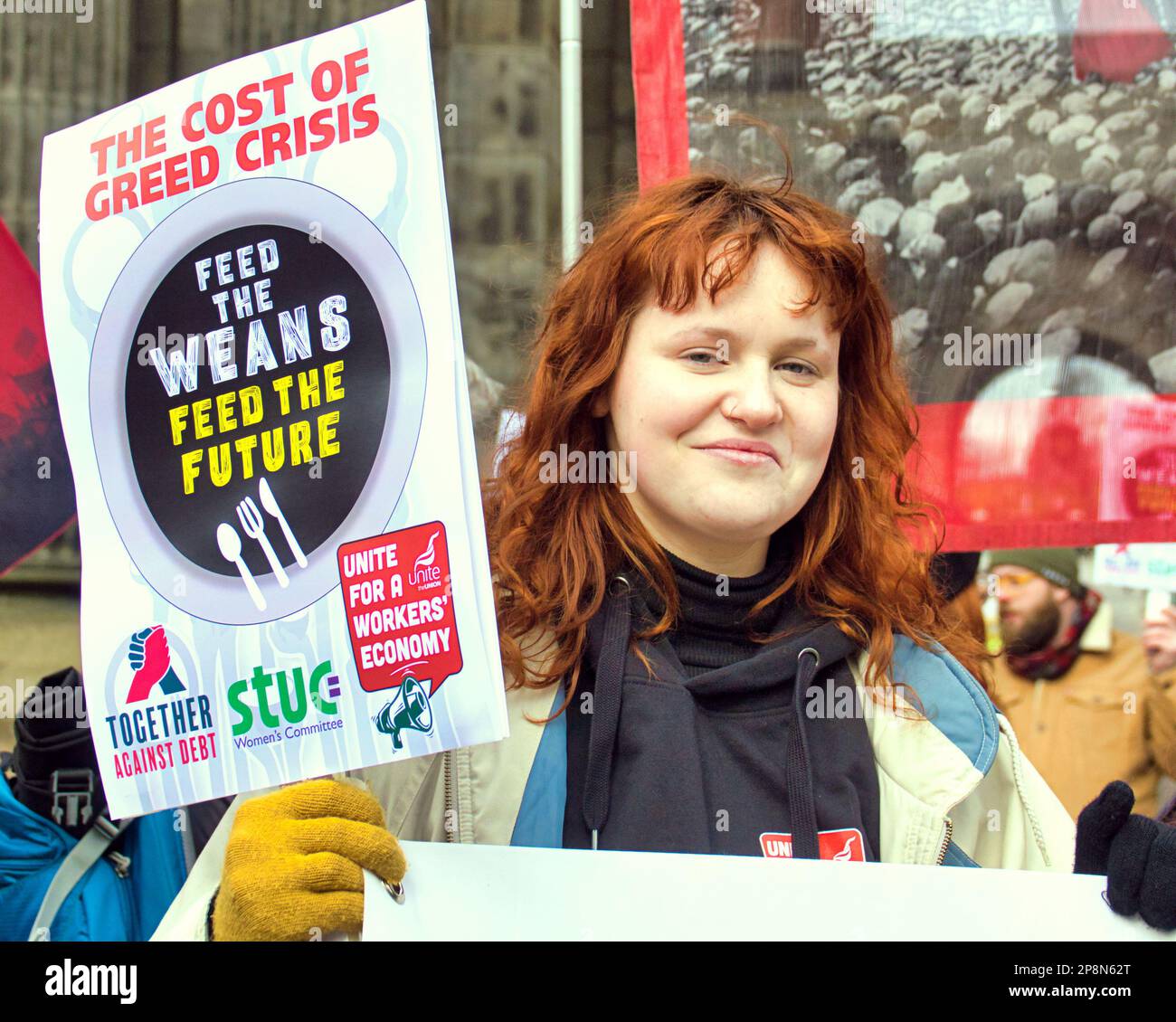 Glasgow, Scotland, UK 9th March, 2023. Activists launch campaign to end school hunger in Glasgow Demonstration On International School Meals Day in support of the ‘School Meals’ campaign Feed the weans protest at city chambers was joined by the wyndford residents union  protesters as they marched around the chambers and posed in John street,, Credit Gerard Ferry/Alamy Live News Stock Photo