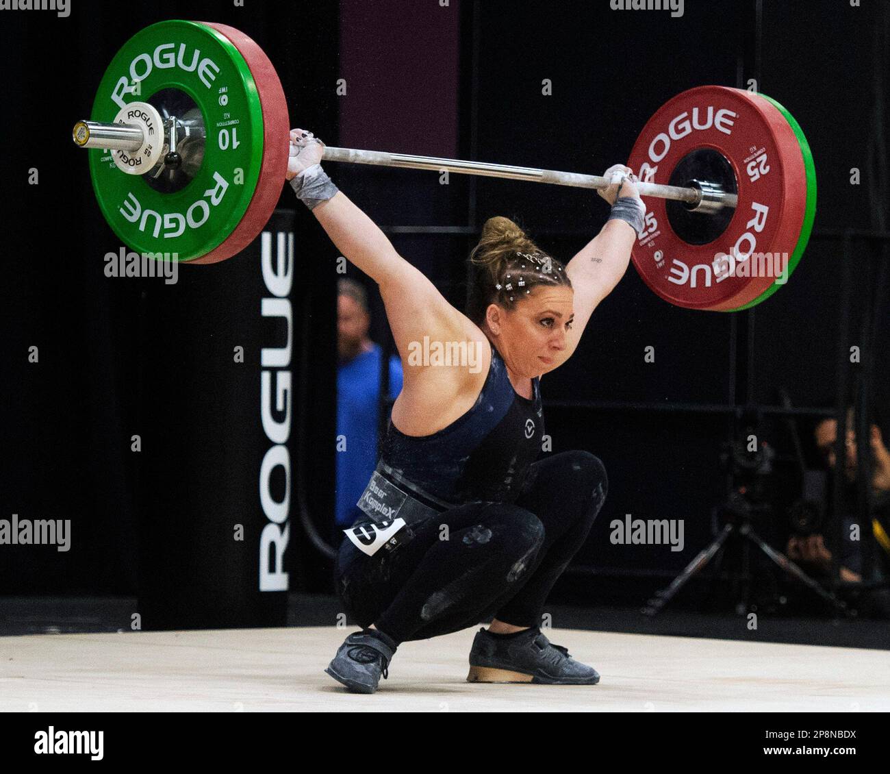 Columbus, Ohio, United States. 3th Mar, 2023. Shelby Pflug competes in the snatch in the Women's 64kg category at the Rogue Stage in Columbus, Ohio, USA. Credit: Brent Clark/Alamy Live News Stock Photo