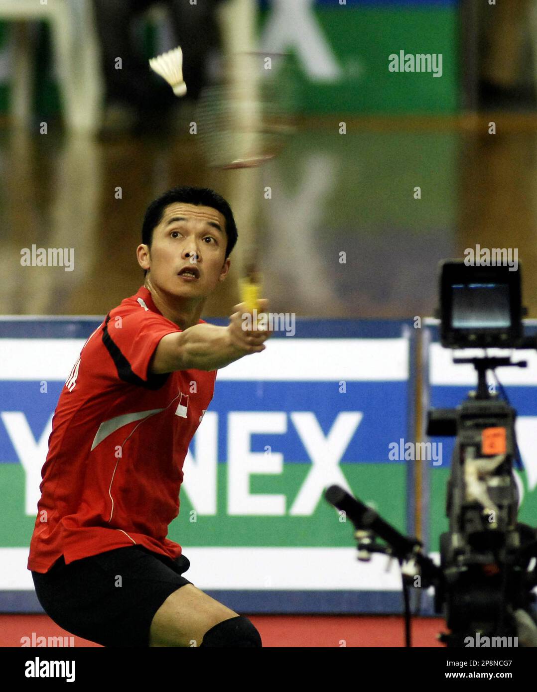 Indonesian badminton player Taufik Hidayat plays a shot against fellow Indonesian Tommy Sugiarto in the mens single semifinal of the Yonex Sunrise India Open 2009 in Hyderabad, India, Saturday, March 28, 2009.
